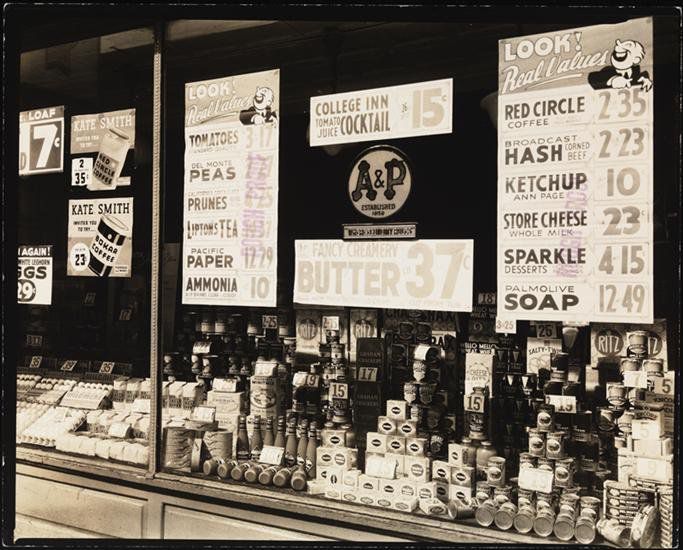 The storefront window of the A & P Grocery Store at 246 Third Avenue between East 20th and 21st Streets.